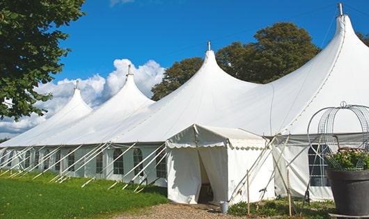 high-quality portable restrooms stationed at a wedding, meeting the needs of guests throughout the outdoor reception in Athens